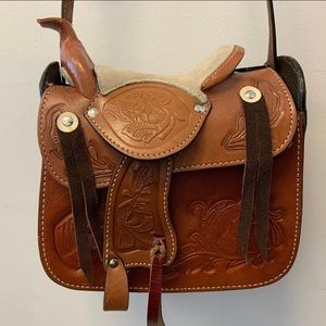 Tan unique saddle purse